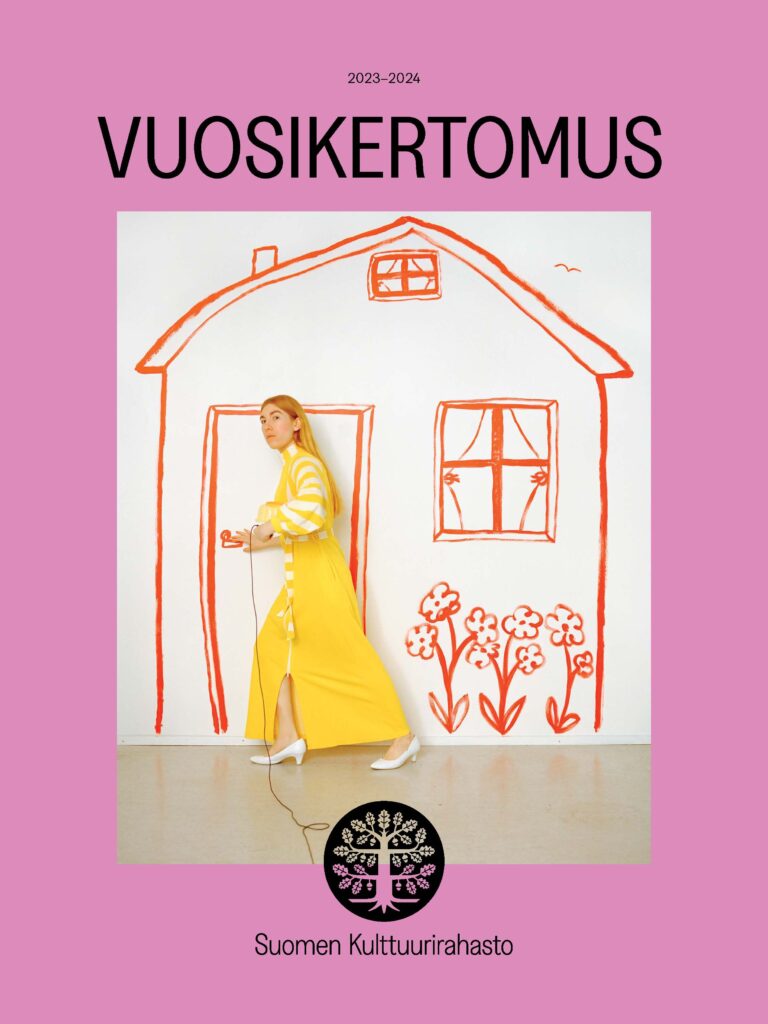 Vaaleanpunainen lehden kansi, jossa valokuvassa nainen keltaisessa mekossa.